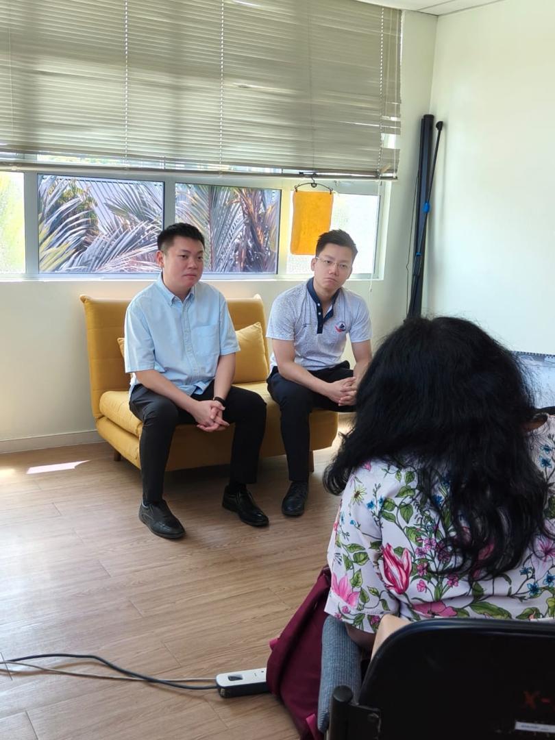 YB Samuel (left) and KC meeting up with a medical personnel of QEH1