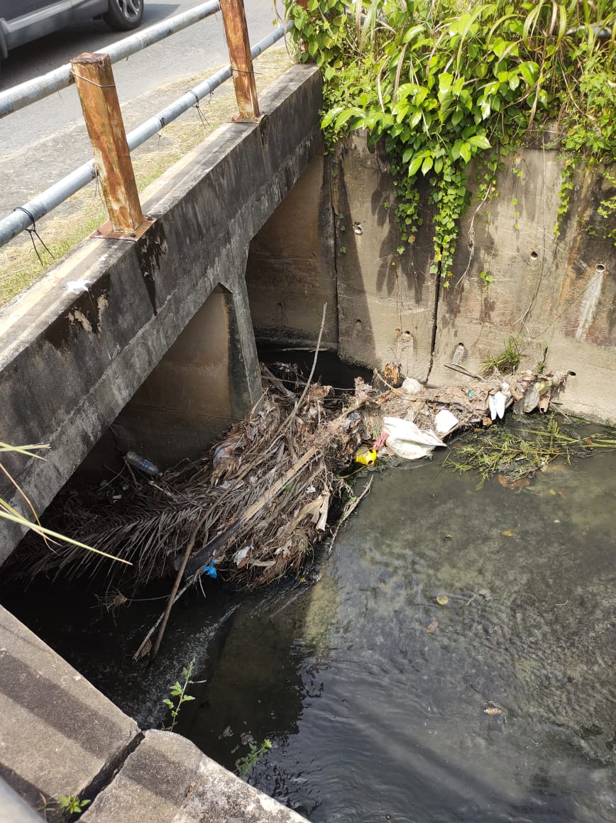Debris piling up in front of cell culvert at Yue Min Primary School