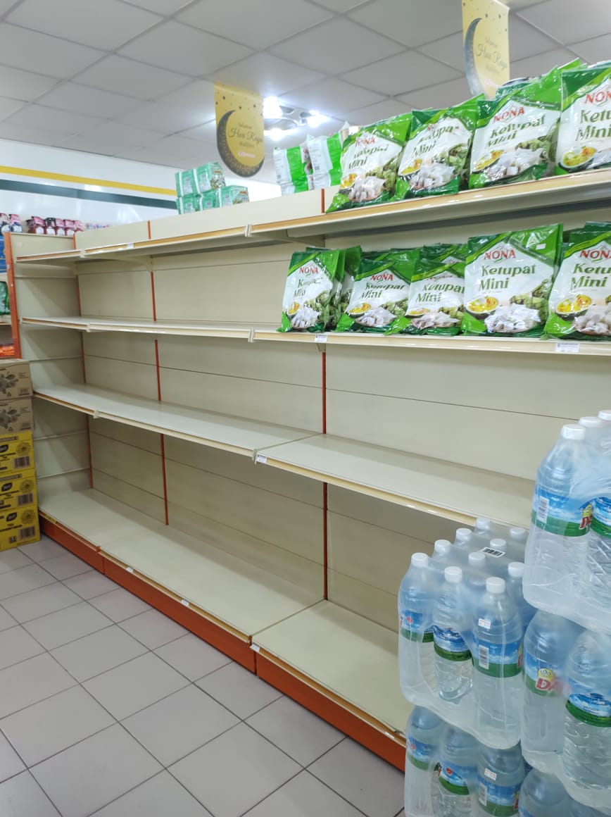 Empty rice shelves at 99 Speedmart Donggongon